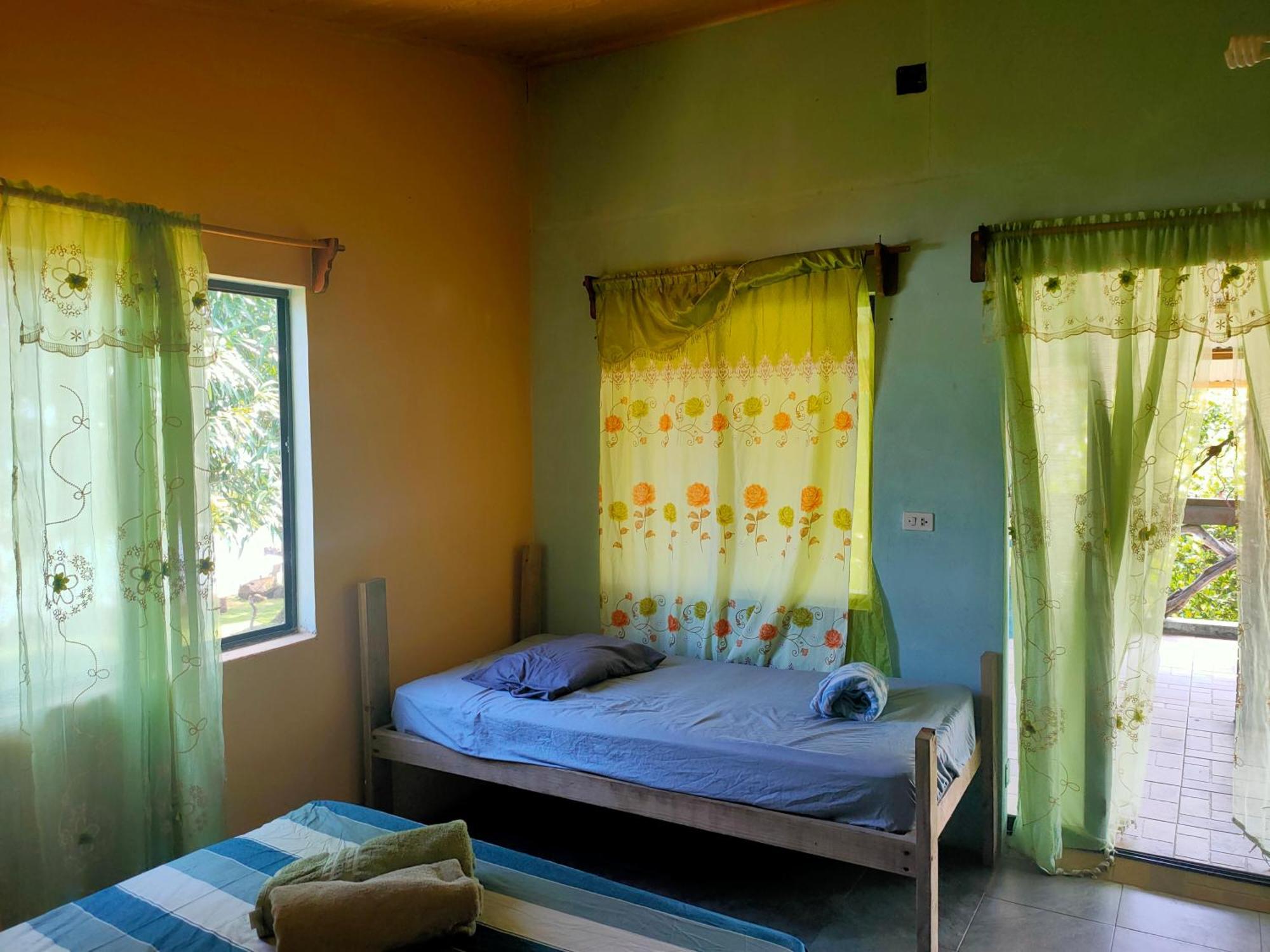 Guesthouse Island Escape South End Pokoj fotografie